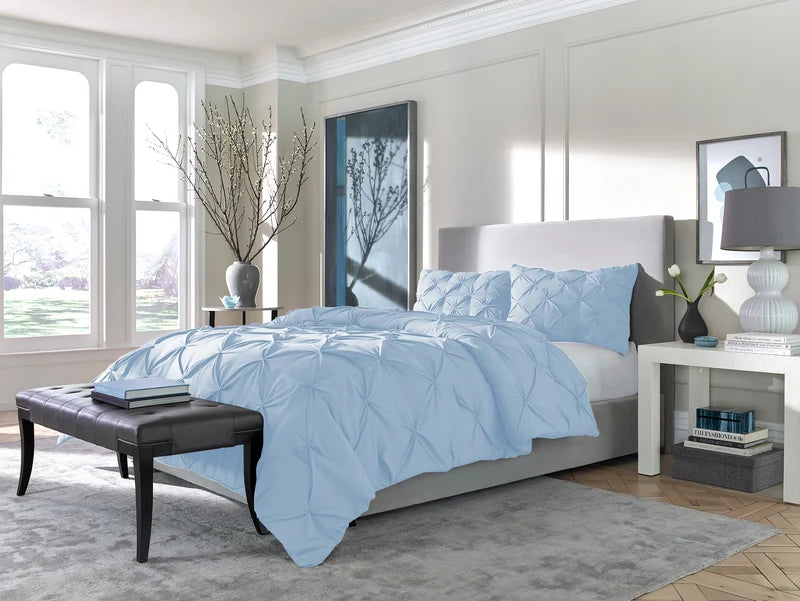 a bedroom with a bed and a bench