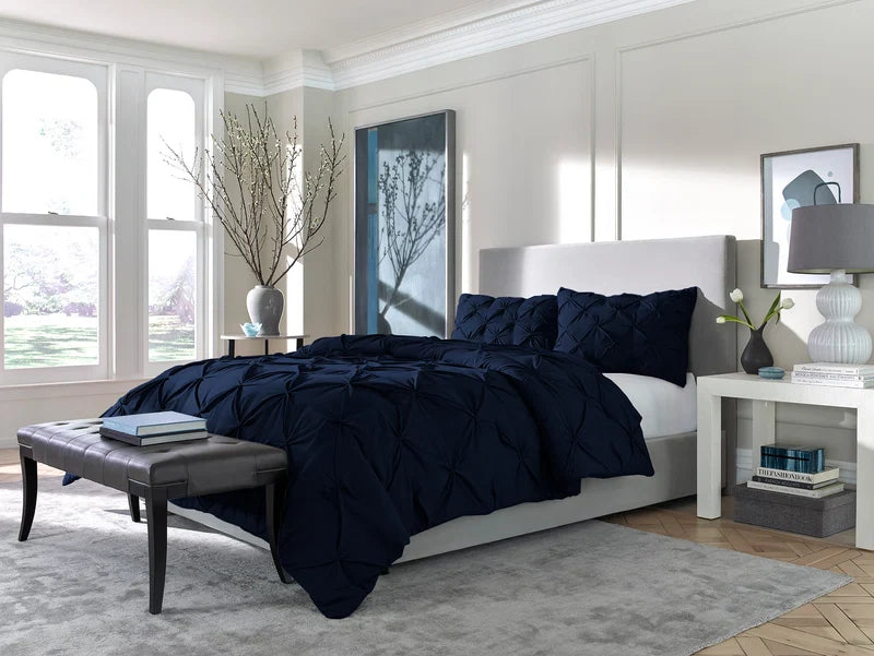 a bedroom with a bed and a table