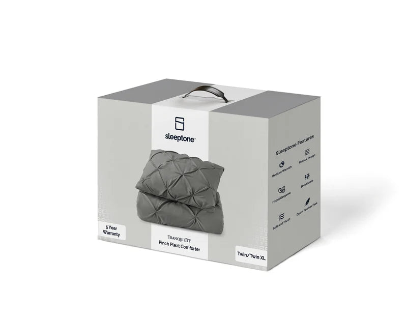 a box with a grey pillow and a black handle